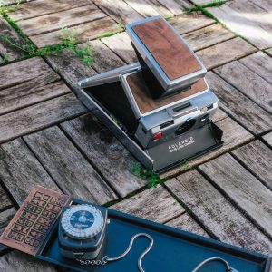 Polaroid SX-70 with american walnut veneer inlay